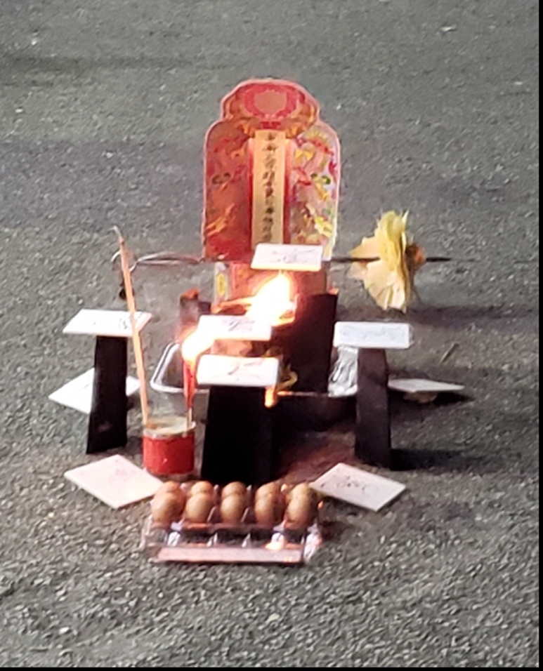A symbolic ritual structure documented at a Singapore funeral