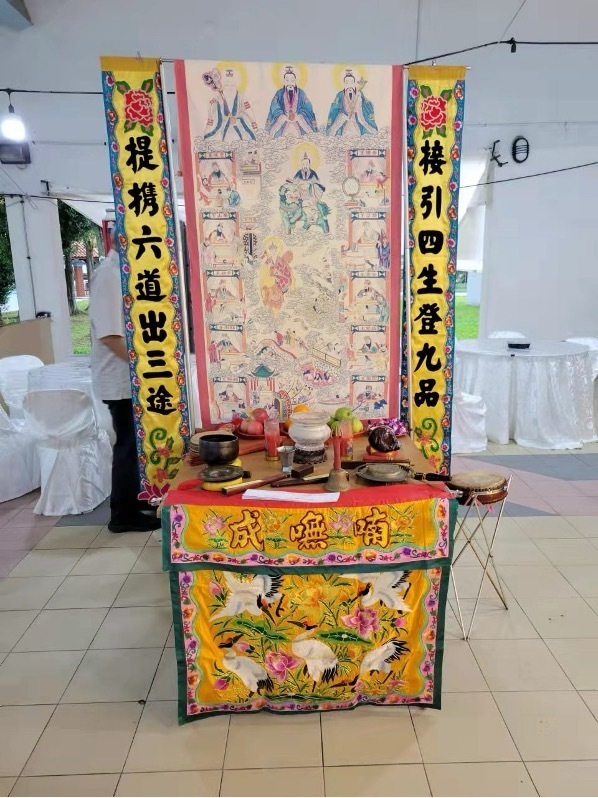 A temporary Taoist altar being set up for a funeral in Singapore